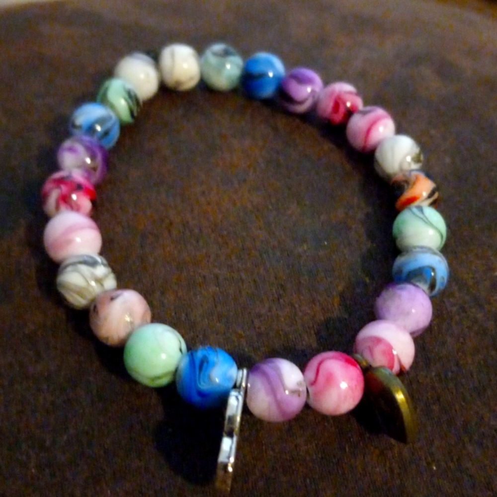Bracelet with two different charms for dog lovers.